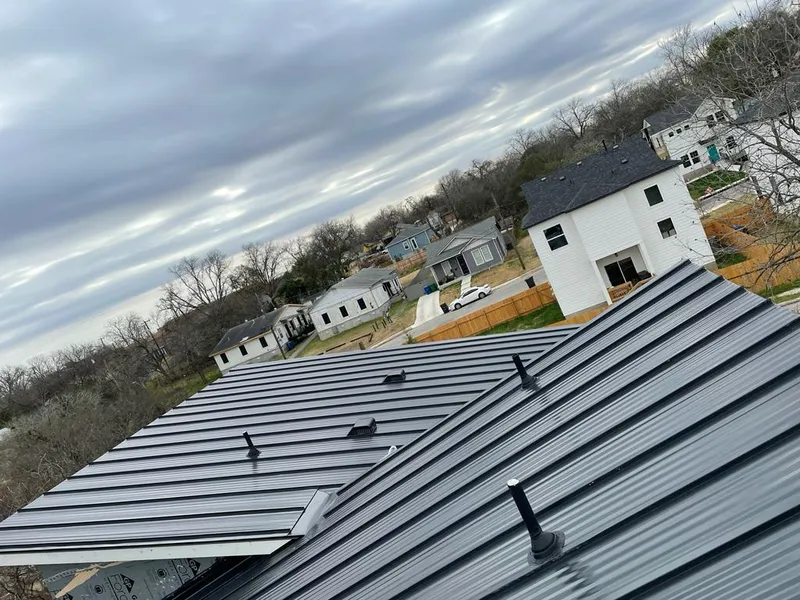 Standing seam metal roof panels with vents for Skylight Repair in Parker